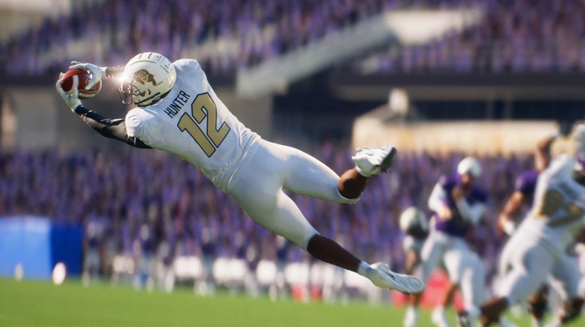 Travis Hunter making an interception in College Football 25.